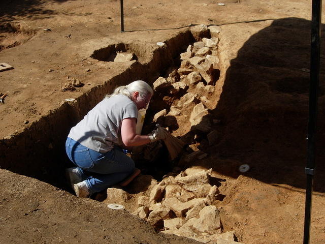 Cleaning back wall of foundation