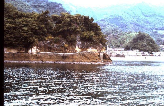 Path around cove - villege in background